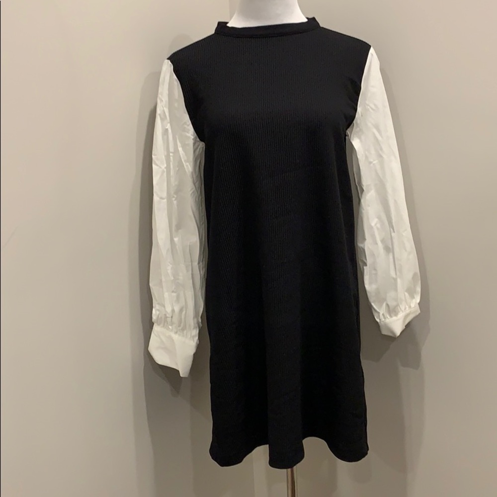 Short black dress with white sleeves